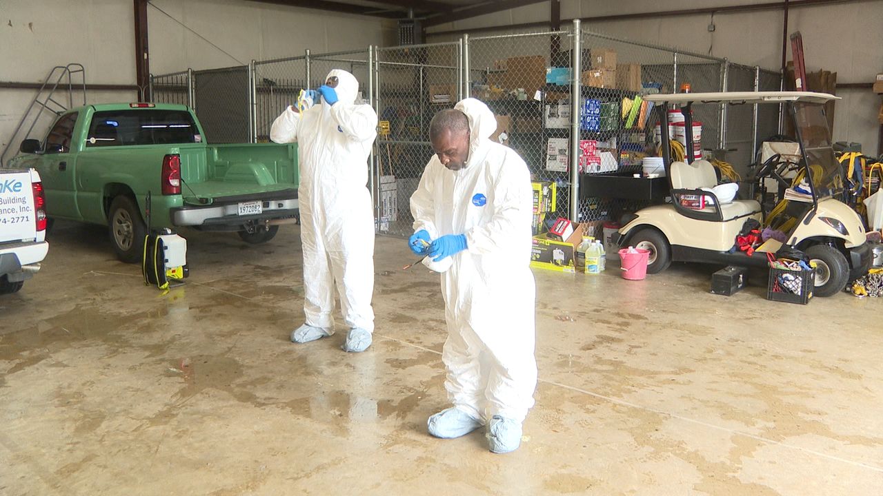 TAKING OFF CLEANING SUITS.jpg